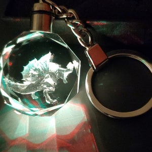 Anjanath Color Changing LED Premium Crystal Laser Engraved 2D Picture Keychain with Souvenir Gift Box & Battery