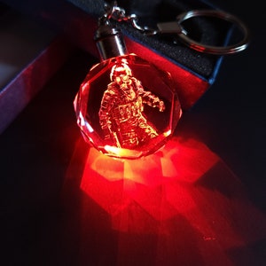 Resident Evil Hunk Color Changing LED Premium Crystal Laser Engraved 2D Picture Keychain with Souvenir Gift Box and Battery