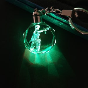 Resident Evil Rebecca Chambers Color Changing LED Premium Crystal Laser Engraved 2D Picture Keychain Video Game Souvenir Gift Box & Battery