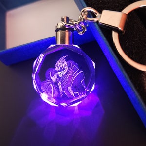 Mass Effect Femshep and Garrus Color Changing LED Premium Crystal Laser Engraved 2D Picture Keychain with Souvenir Gift Box and Battery