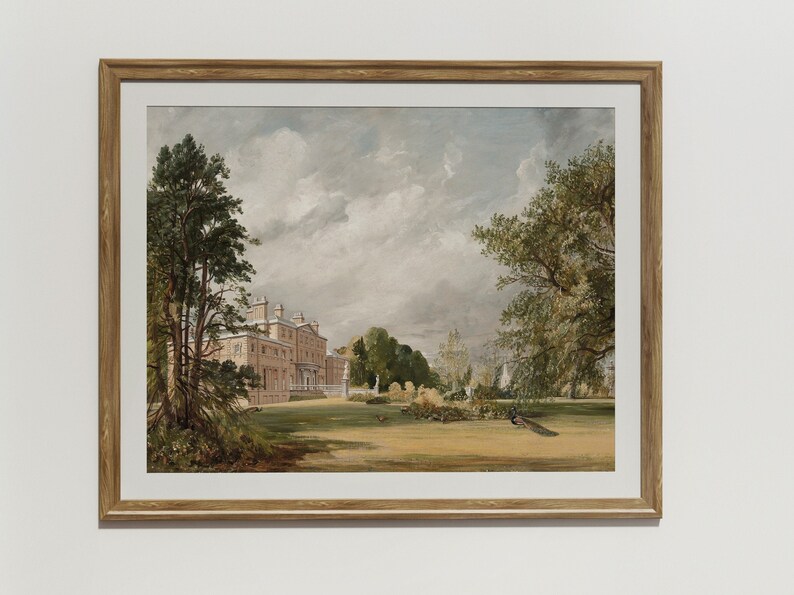 May include: A framed watercolour painting depicting a large, pink mansion with a green lawn and trees in the foreground. The sky is cloudy and blue. There are peacocks in the lawn.
