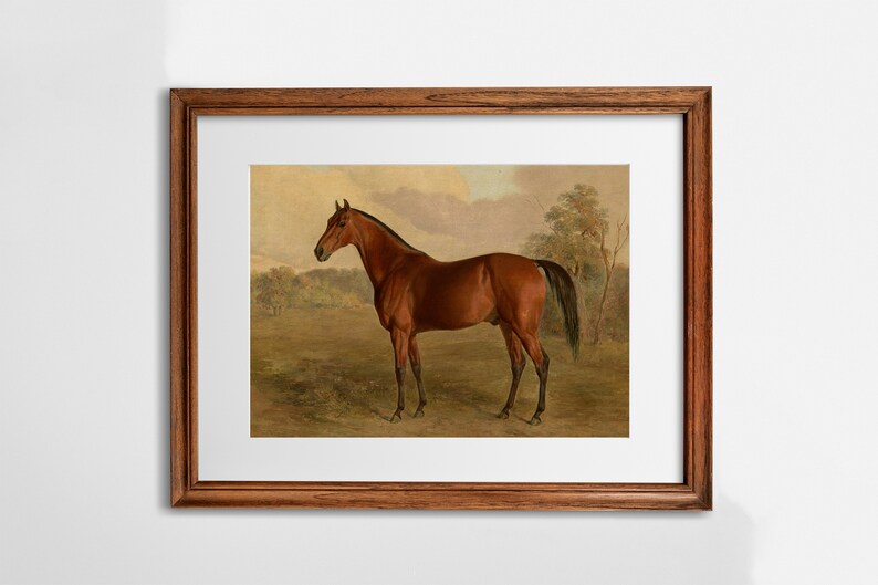 May include: A framed painting of a brown horse standing in a field. The horse is facing to the left and has a long tail. The background is a landscape with trees and a cloudy sky.