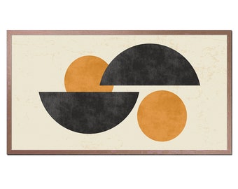 May include: Abstract geometric art print with black and orange semi-circles on a cream background. The print is framed in a light brown wood frame.