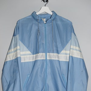 Raincoat adidas india sale