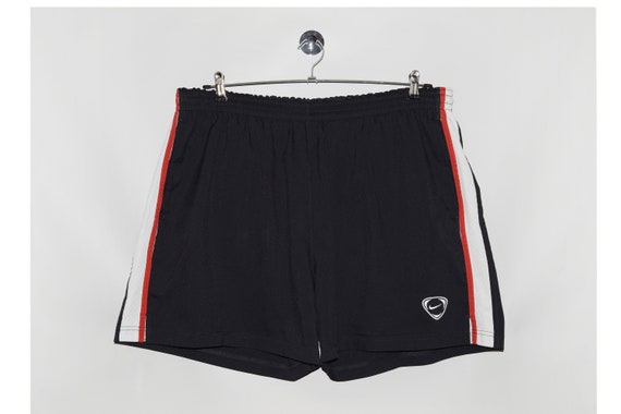 black nike shorts with red stripe