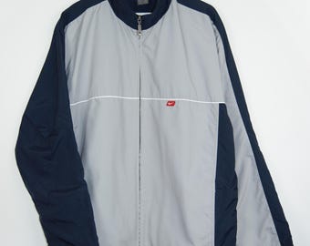 Chaqueta deportiva Nike vintage de los años 00, estilo retro, cortavientos deportivo, ligera, estilo urbano.