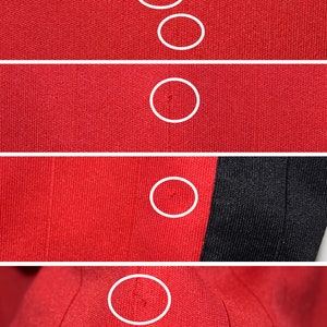 May include: Close-up of a red fabric with five small holes. The fabric has a textured, woven appearance. The holes are circled in white.