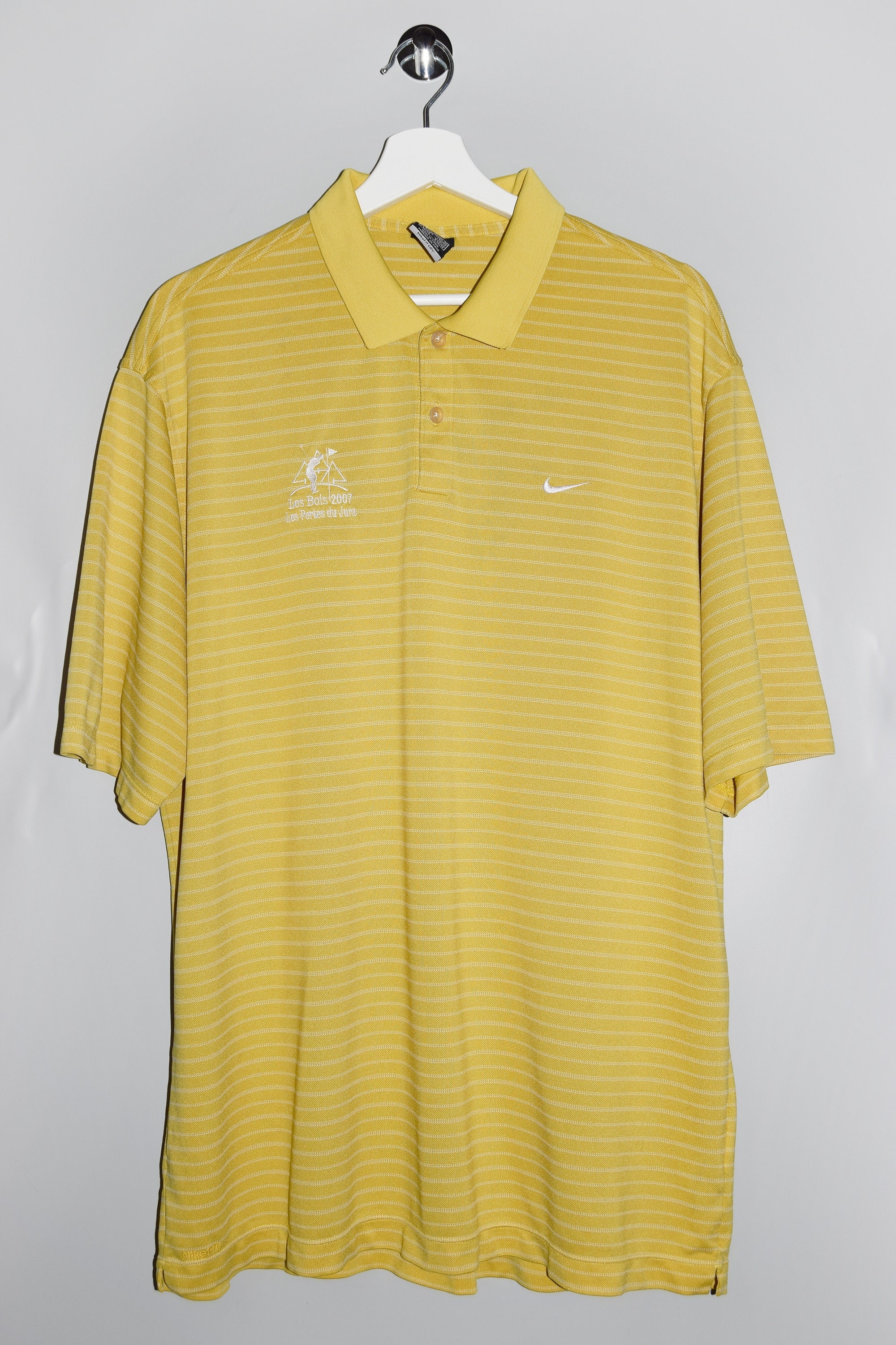 yellow nike golf shirt