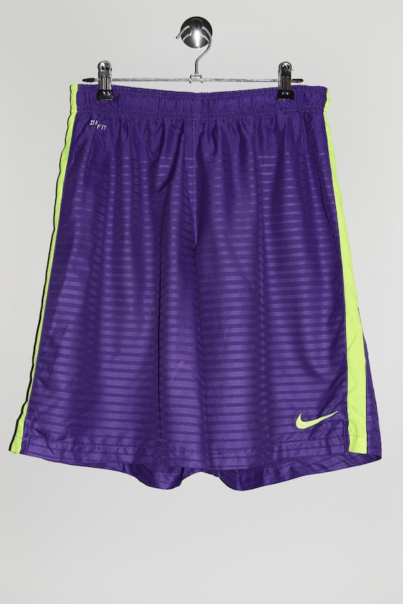purple and green nike shorts