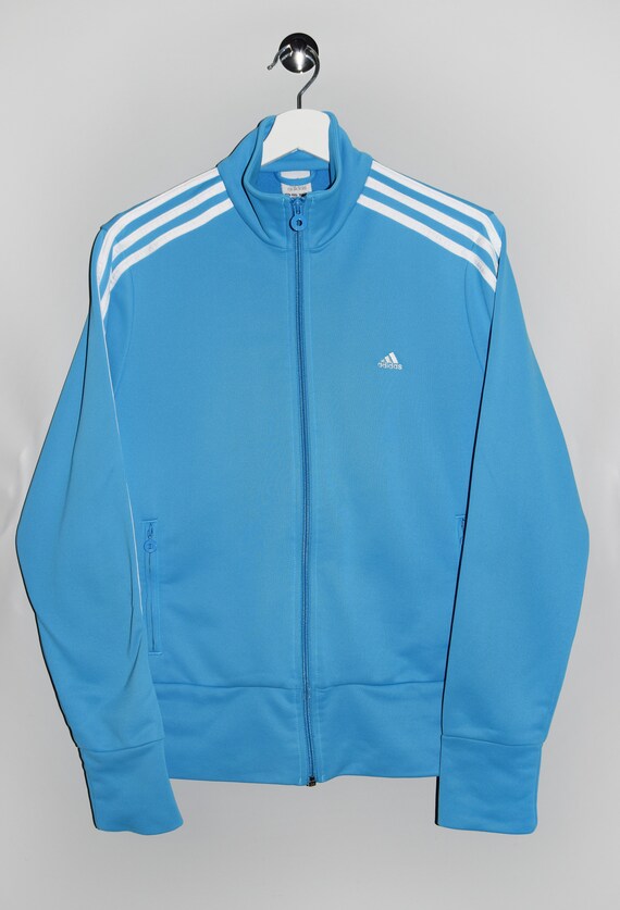 light blue adidas track top