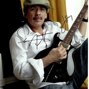 Carlos Santana  autographed signed 8x10 photograph - to john