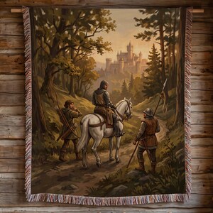 May include: A rectangular woven tapestry featuring a medieval scene with a knight on a white horse, an archer, and a spearman on a forest path leading to a distant castle. The tapestry has fringed edges and displays earthy tones of green and brown.
