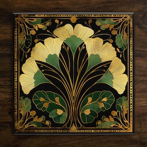 May include: A black square tile with a gold and green floral design. The design features stylized leaves and flowers with a repeating pattern.