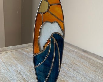 Stained glass surfboard with crashing wave and sunset suncatcher