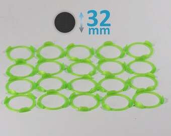 May include: Twenty-four bright green plastic rings, each with a diameter of 32 mm. The rings are arranged in a rectangular grid.