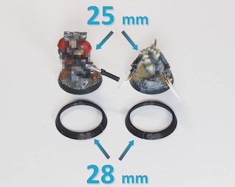 May include: Two black plastic miniature bases, one measuring 25 mm in diameter and the other measuring 28 mm in diameter. The bases are designed for use with miniature figures.