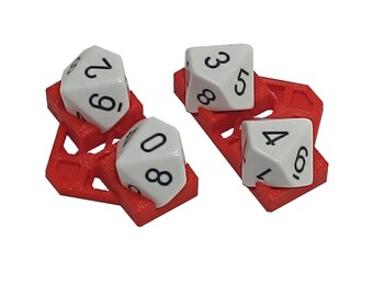 May include: Four white dice with black numbers are held in red plastic holders. The dice show the numbers 2, 6, 9, 3, 5, 8, 4, 1, 6, and 0, 8.