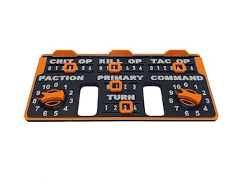 May include: A black plastic game board with orange dials and labels. The labels read "Crit Op", "Kill Op", "Tac Op", "Faction", "Primary", "Command", and "Turn".