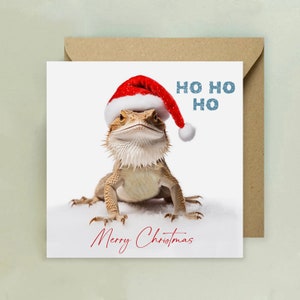 Cartolina di buon Natale con drago barbuto