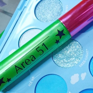Long wear hydrating lipgloss in &quot;area 51&quot; lime green