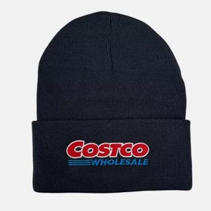May include: Black knit beanie with the Costco Wholesale logo in red, blue, and white.