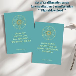 May include: Two teal affirmation cards with gold geometric designs and text. One card reads "EVERY DAY IN EVERY WAY I AM BECOMING RICHER AND RICHER." The other card reads "I LOVE MONEY MONEY LOVES ME MONEY FLOWS TO ME ENDLESSLY." The text "soulspiration" is at the bottom of each card.