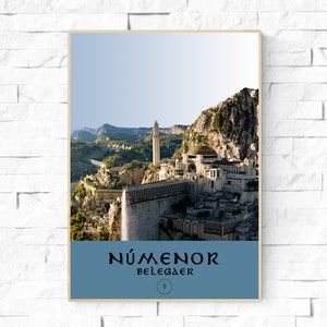 May include: A poster with a blue background and the text "Númenor Belegaer" in black. The poster features a scenic image of a city built into a mountainside with a large tower and a waterfall.