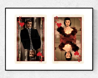 May include: Two playing cards, the King and Queen of Hearts, featuring images of Clark Gable and Vivien Leigh from the movie Gone With The Wind.
