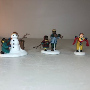 Dept 56: Playing in the Snow- Christmas in the City Series; Department 56 - RETIRED ; Village Accessories - Christmas Village Scene Decor