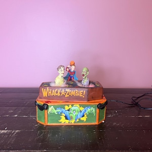Dept 56: Whack A Zombie -Halloween Snow Village Series- Department 56 - RETIRED; Vintage Halloween Fall Motion Village Scene Decorations