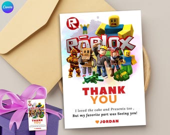 May include: A white thank you card with a colorful Roblox logo and characters. The text reads "Thank You" in red and orange. The card also includes the text "I loved the cake and Presents too, But my favorite part was Seeing you!  JORDAN".