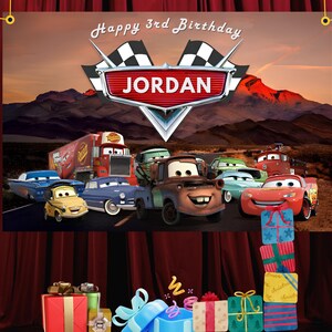 May include: A white ceramic mug with a black handle and the text "But First, Coffee" in a bold, black font. The mug is set against a blurred background, suggesting a cozy setting.