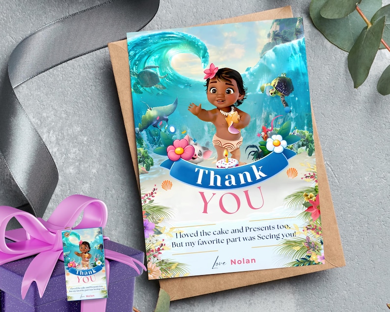 May include: A thank you card with a cartoon image of a girl with brown skin and dark hair wearing a flower crown and a lei. The card has a blue and green ocean background with a wave and a sea turtle. The text on the card reads "Thank You" in pink letters and "I loved the cake and presents too, But my favorite part was seeing you! Love Nolan".