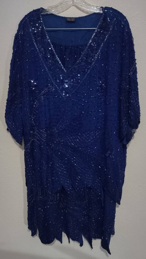 Vintage women's blue beaded skirt and top set by M