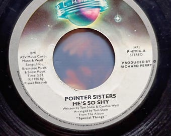 The Pointer Sisters - A side) Movin' On and B side) He's So Shy 1980 on a 45 rpm record Planet P-47916.