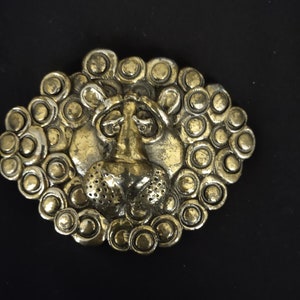 Vintage 1970s Lions Head belt buckle by The Great American Chicago Buckle Co