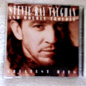 Stevie Ray Vaughan and Double Trouble - Greatest Hits 1983-1995 released 1995 on Epic EK 66217