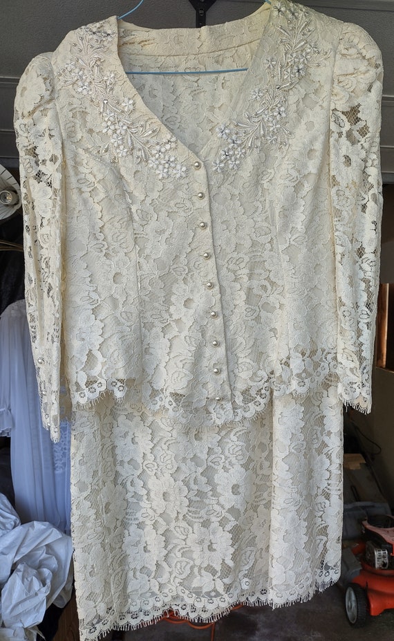 Ladies white 2pc ivory and lace skirt and top from