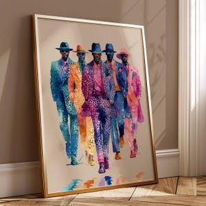 May include: A framed watercolour print featuring five figures in colourful suits and hats. The suits display patterns and shades of blue, orange, pink, and purple. The artwork is presented in a gold-coloured frame, enhancing the visual appeal of the piece.