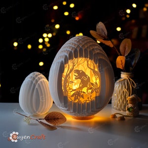 PDF, SVG, Studio Template T-Rex Dinosaur Egg Pop up, 3D Papercut Light Box Sliceform Paper Sphere Popup, 3d lamp svg, Dinosaur night light