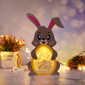 Lapin avec oeuf voiture lapin câlin oeuf lanterne - oeuf de Pâques Shadow Box SVG, PDF, Silhouette, Lightbox lapin de Pâques, modèle de découpe en papier oeuf de Pâques