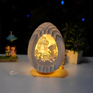 Recoger huevos de Pascua Pop-up PDF, SVG, Studio Template Easter Bunny Eggs Pop-up, 3D Papercut Light Box Sliceform Paper Sphere Popup