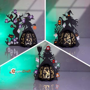 Può includere: Tre lanterne di carta a tema Halloween con sagome di streghe, alberi, fantasmi e zucche. Le lanterne presentano intricati disegni traforati e sono illuminate dall'interno, creando un'atmosfera spettrale. Le lanterne sono nere con accenti arancioni e viola.