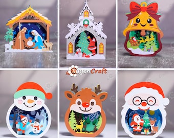 Può includere: Una collezione di ritagli di carta a strati a tema natalizio. I disegni includono una scena della natività, una chiesa, una campana, un pupazzo di neve, una renna e Babbo Natale. Ogni ritaglio presenta dettagli intricati e colori vivaci.