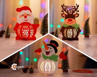 Pack de 3 faroles navideños en PDF, SVG y plantillas de estudio. Farol de muñeco de nieve, de Papá Noel y de reno (lámpara de papel recortado).