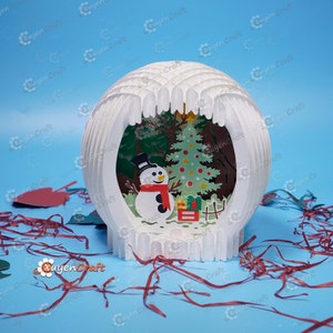 Versión en color: globo de nieve emergente/SVG, plantilla de estudio que crea luz nocturna de papel para Navidad, caja de luz de corte de papel de muñeco de nieve de esfera