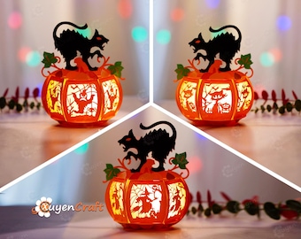 May include: A 3D papercraft pumpkin with a black cat on top. The pumpkin is lit from inside and has a Halloween-themed design with a witch, a ghost, and a spider web.