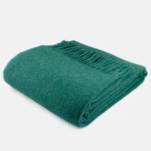 100% sheep wool blanket in Christmas green. Mustard yellow wool plaid. High quality wool sofa throw in red. Cozy natural bed blanket in grey