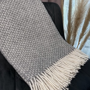 100% sheep wool blanket in grey. Warm mustard yellow wool plaid. High quality wool sofa throw in green. Cozy natural bed blanket in beige