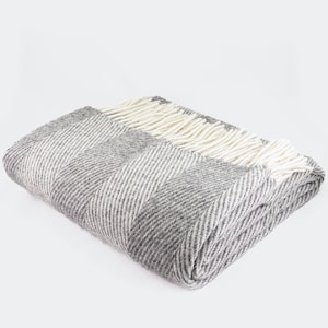 100% sheep wool blanket in grey. Beige wool plaid. High quality wool sofa throw in grey. Cozy natural bed blanket in beige